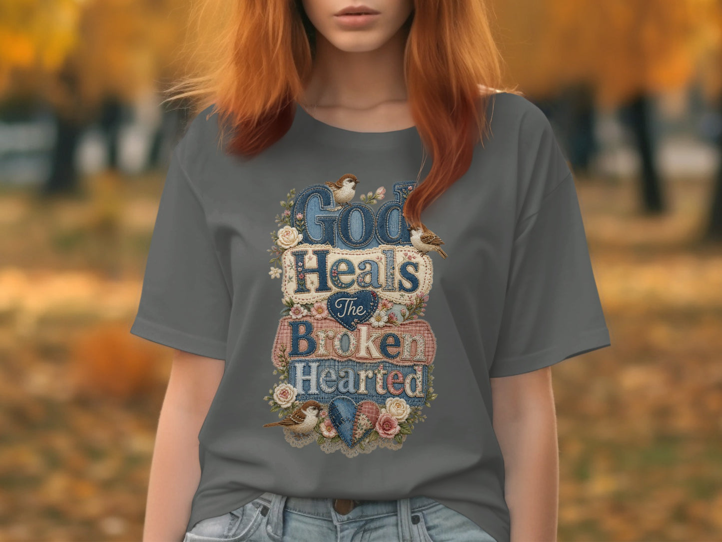 Gray t-shirt with "God Heals The Broken Hearted" text, birds, and floral accents.