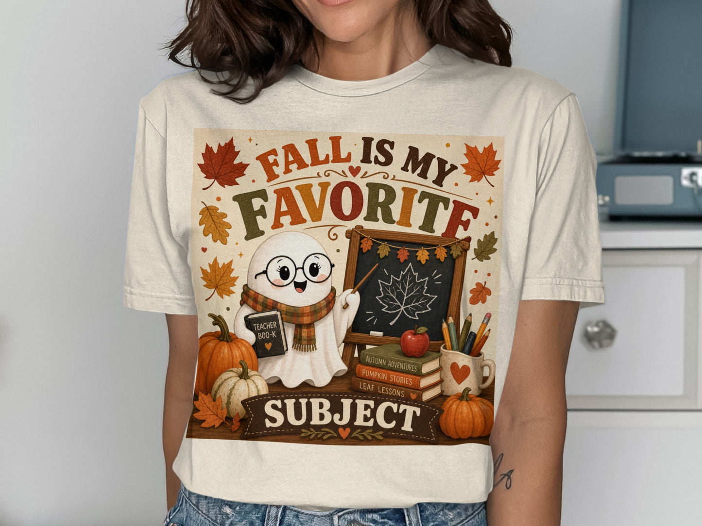 Ghost wearing glasses and scarf pointing at chalkboard, "Fall is my favorite subject."