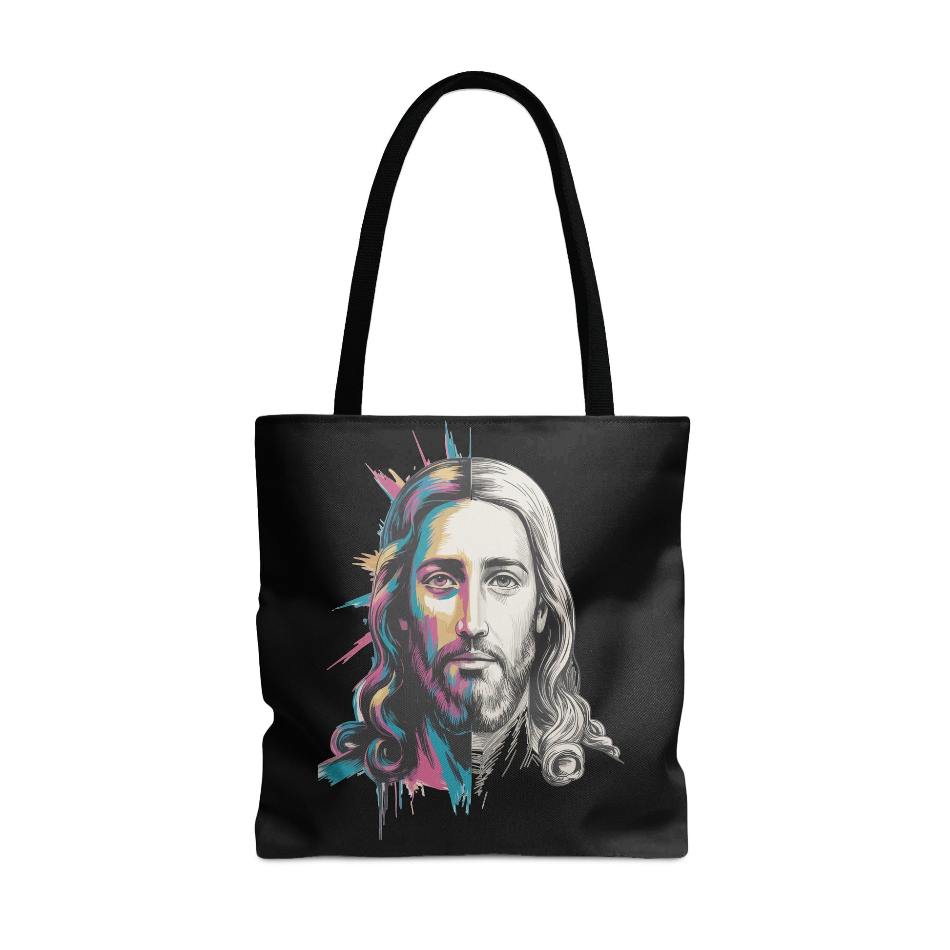 Black tote bag with a split graphic of Jesus's face in black and white and vibrant colors.