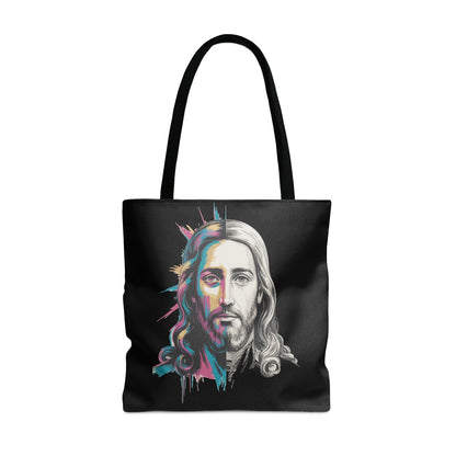 Black tote bag with a split graphic of Jesus's face in black and white and vibrant colors.