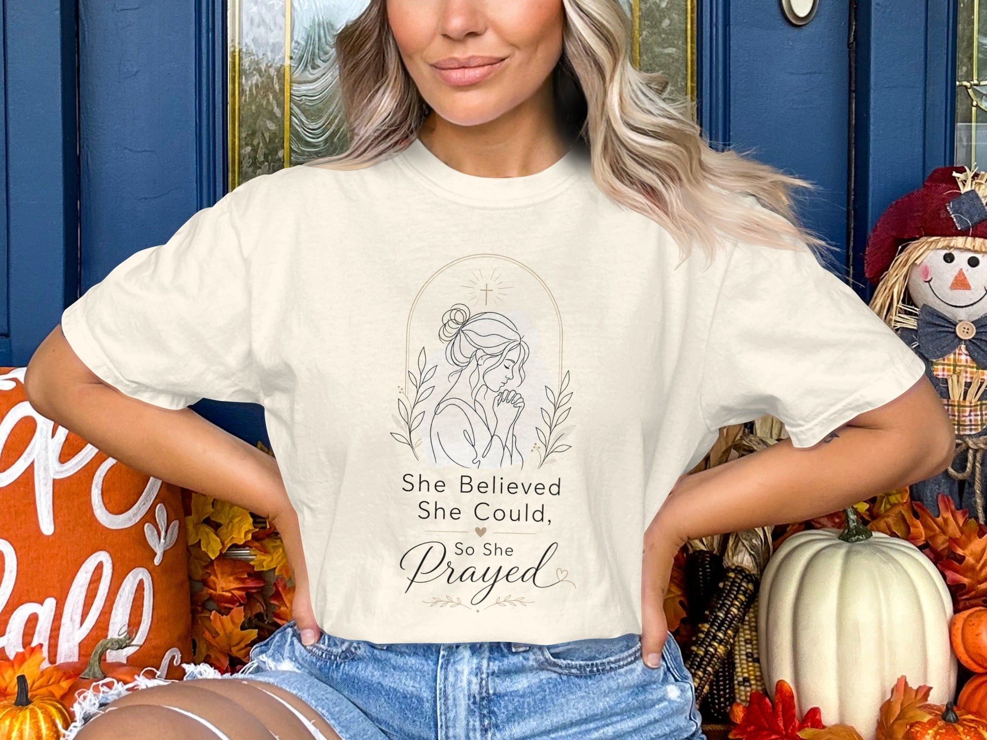 Cream t-shirt with graphic: "She Believed She Could, So She Prayed."