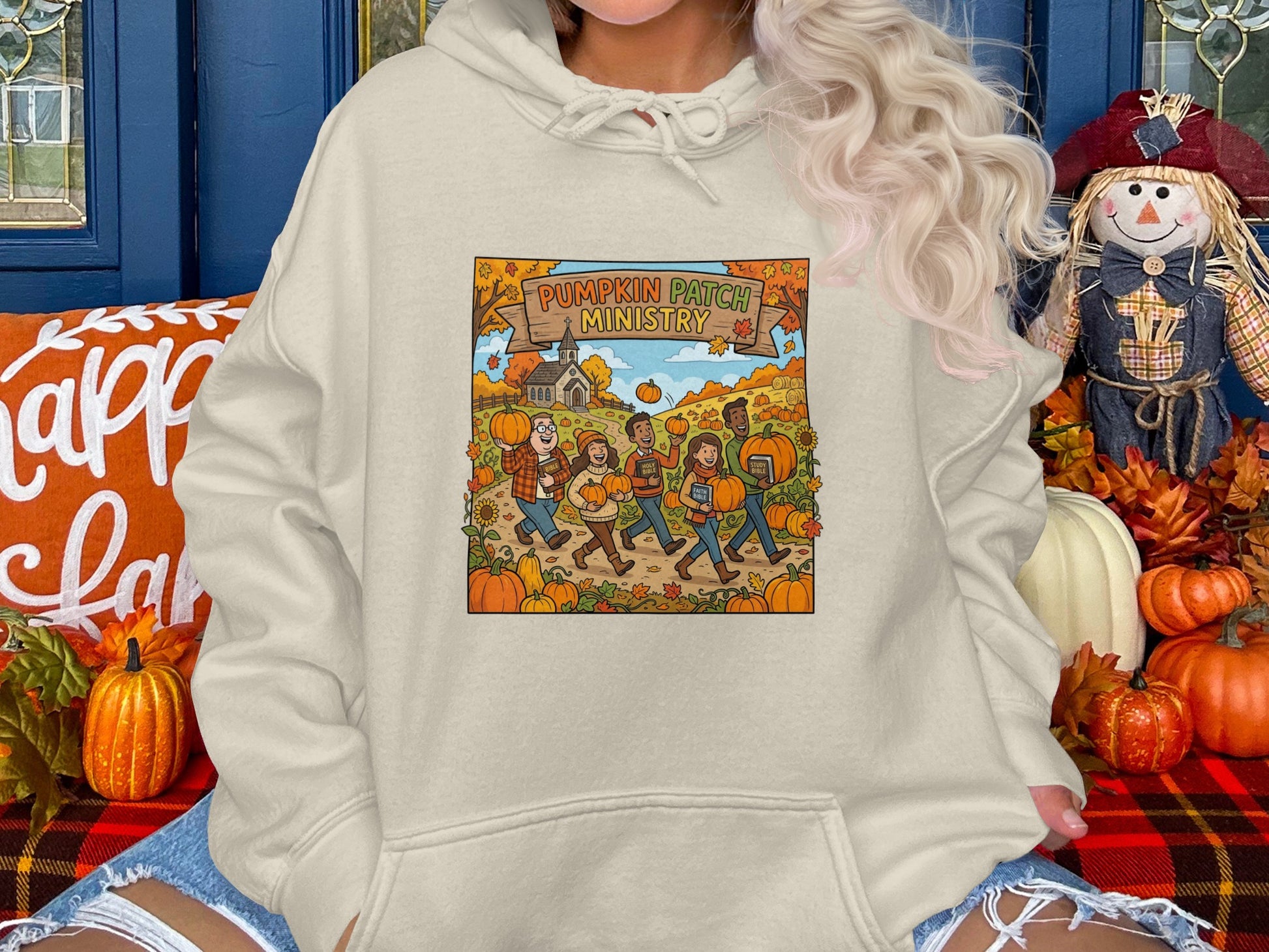 People walking through a pumpkin patch with "Pumpkin Patch Ministry" sign.