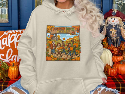 People walking through a pumpkin patch with "Pumpkin Patch Ministry" sign.