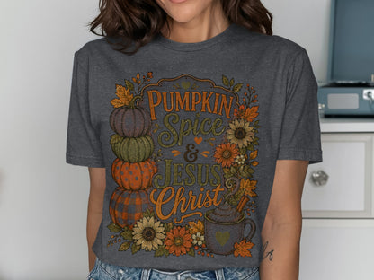 Dark gray t-shirt with "Pumpkin Spice & Jesus Christ" design and autumn floral elements.