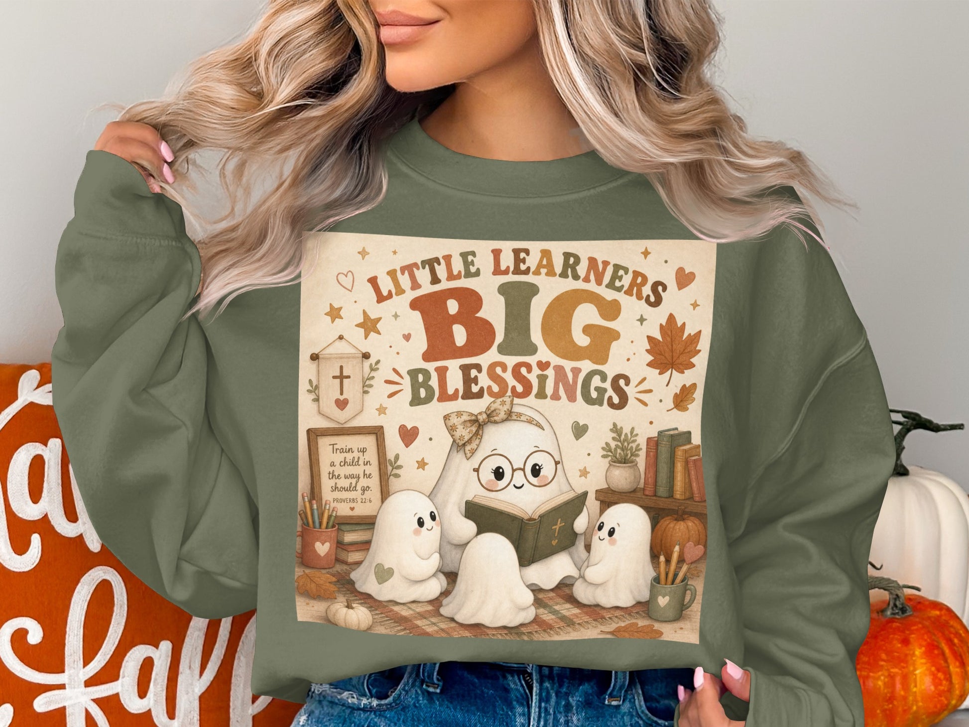 Crewneck sweatshirt with "Little Learners Big Blessings" and ghosts reading a book.