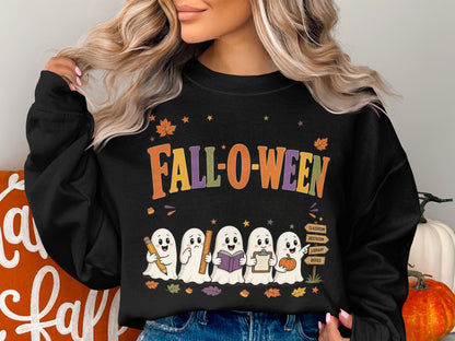 Black sweatshirt with "Fall-o-ween" text and ghosts holding school supplies and a pumpkin.