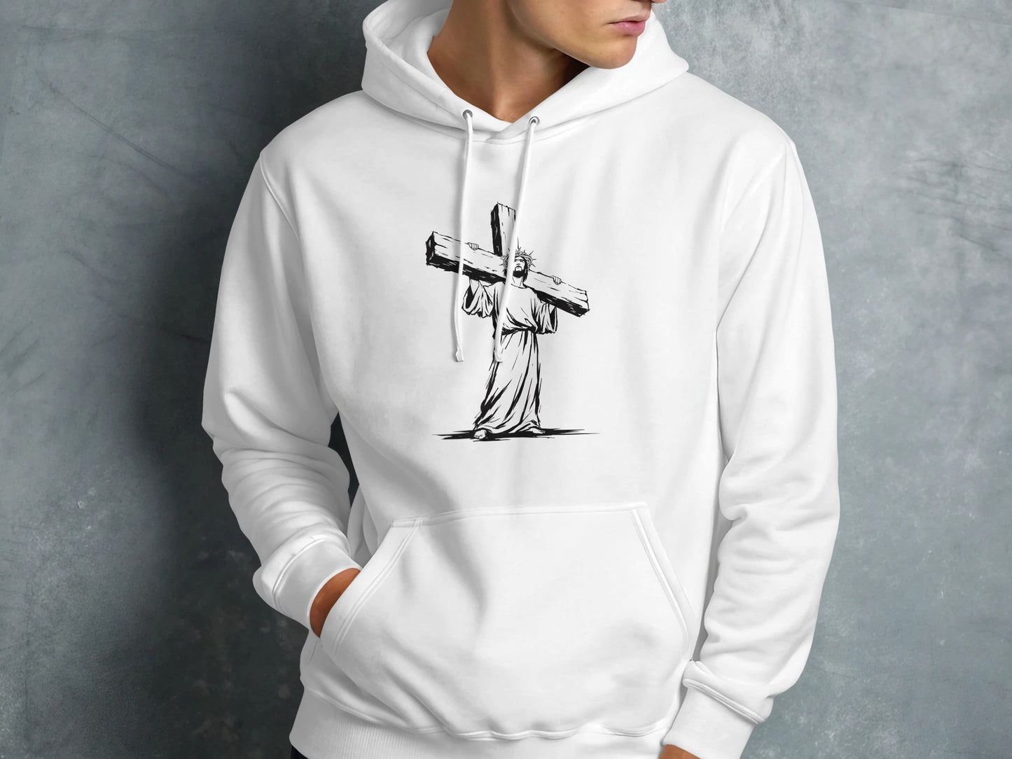 White hoodie with a black outline drawing of Jesus carrying a cross.
