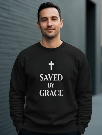 Black crewneck sweatshirt with white "SAVED BY GRACE" text and cross.