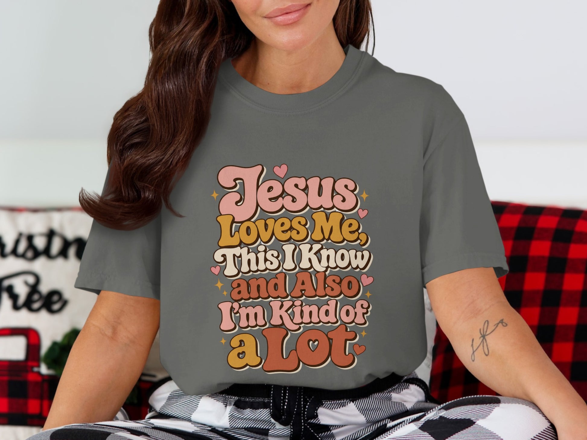 Dark gray t-shirt with "Jesus Loves Me, This I Know and Also I'm Kind of a Lot" text.