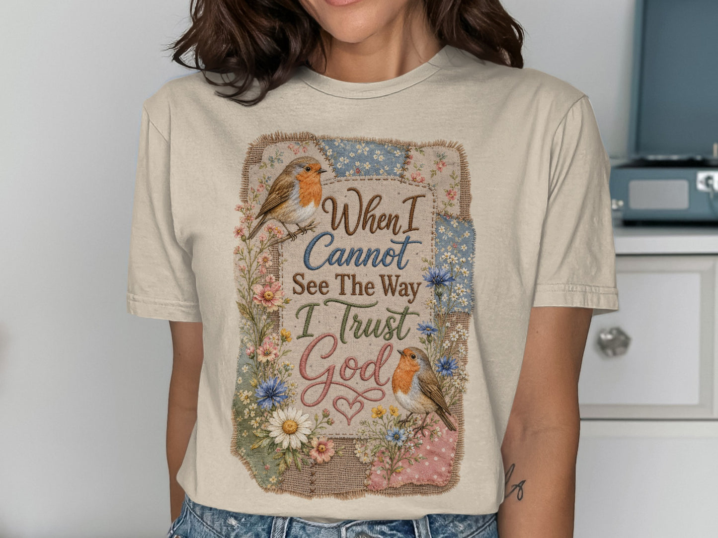 T-shirt with birds, flowers, and "When I Cannot See The Way I Trust God" text.