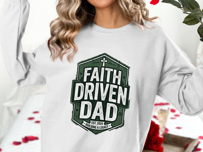 White sweatshirt with "Faith Driven Dad" hexagon graphic, est. 2024.