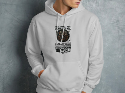 White hoodie with John 16:33 Bible verse and owl graphic.