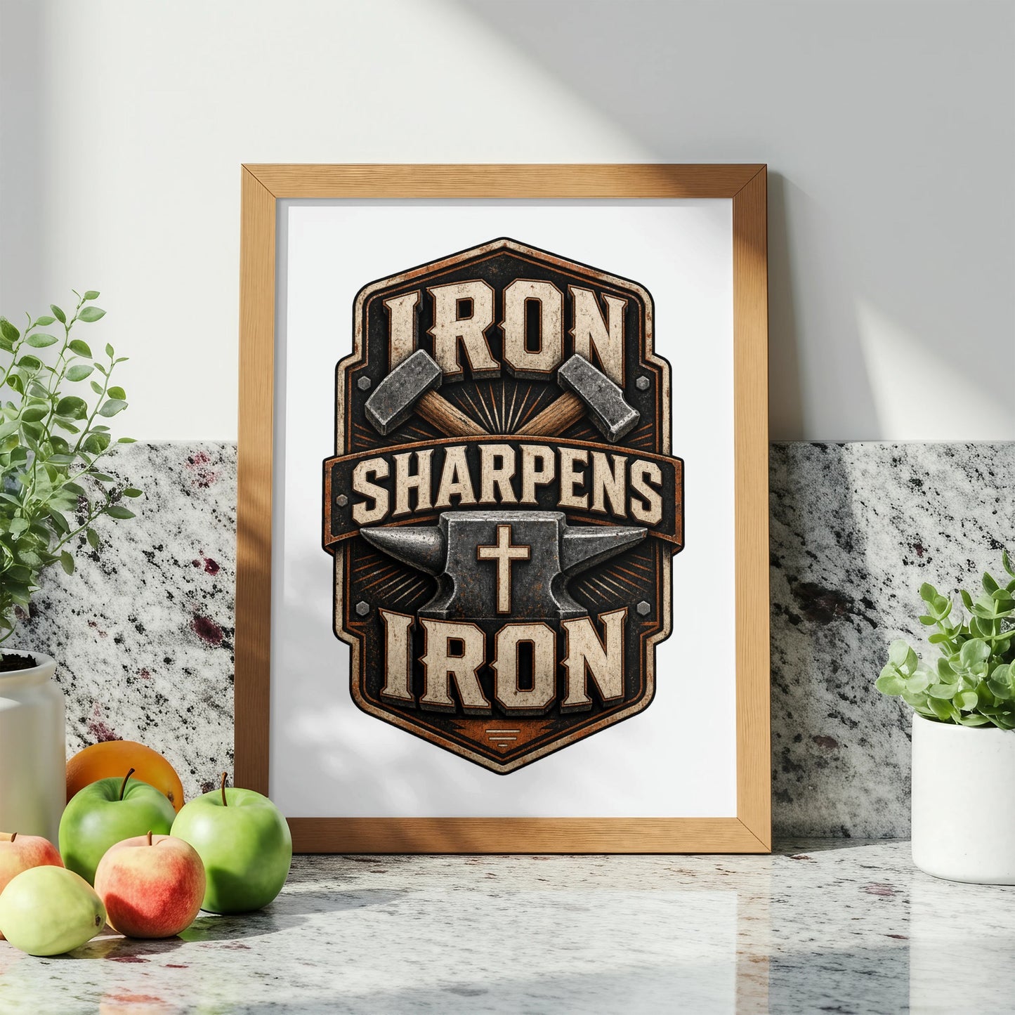 Framed artwork with text "Iron Sharpens Iron," an anvil, and hammers.