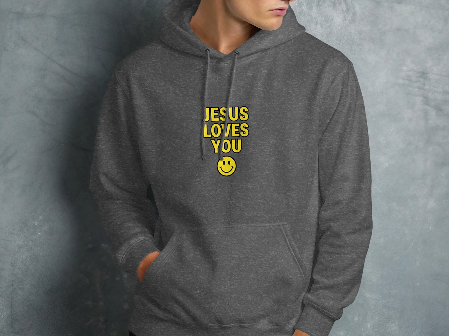 Dark grey hoodie with "JESUS LOVES YOU" and smiley face.