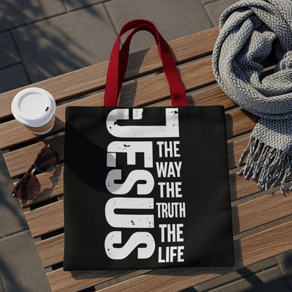 Black tote bag with white text "JESUS THE WAY THE TRUTH THE LIFE".