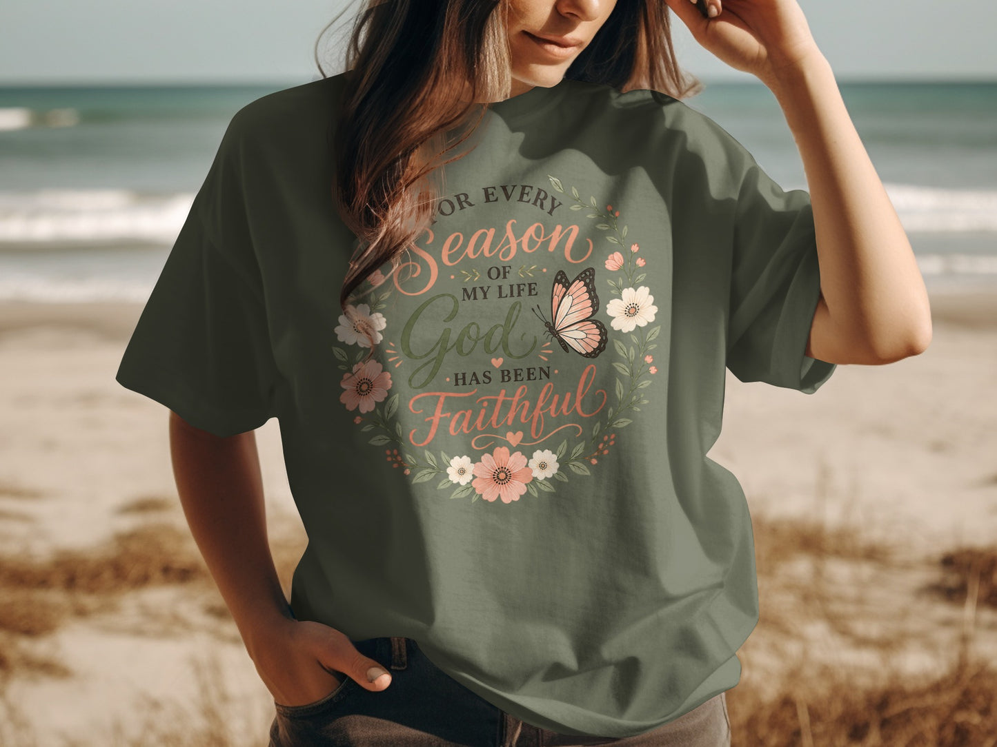T-shirt with floral wreath, butterfly, and text "For every season of my life God has been faithful."