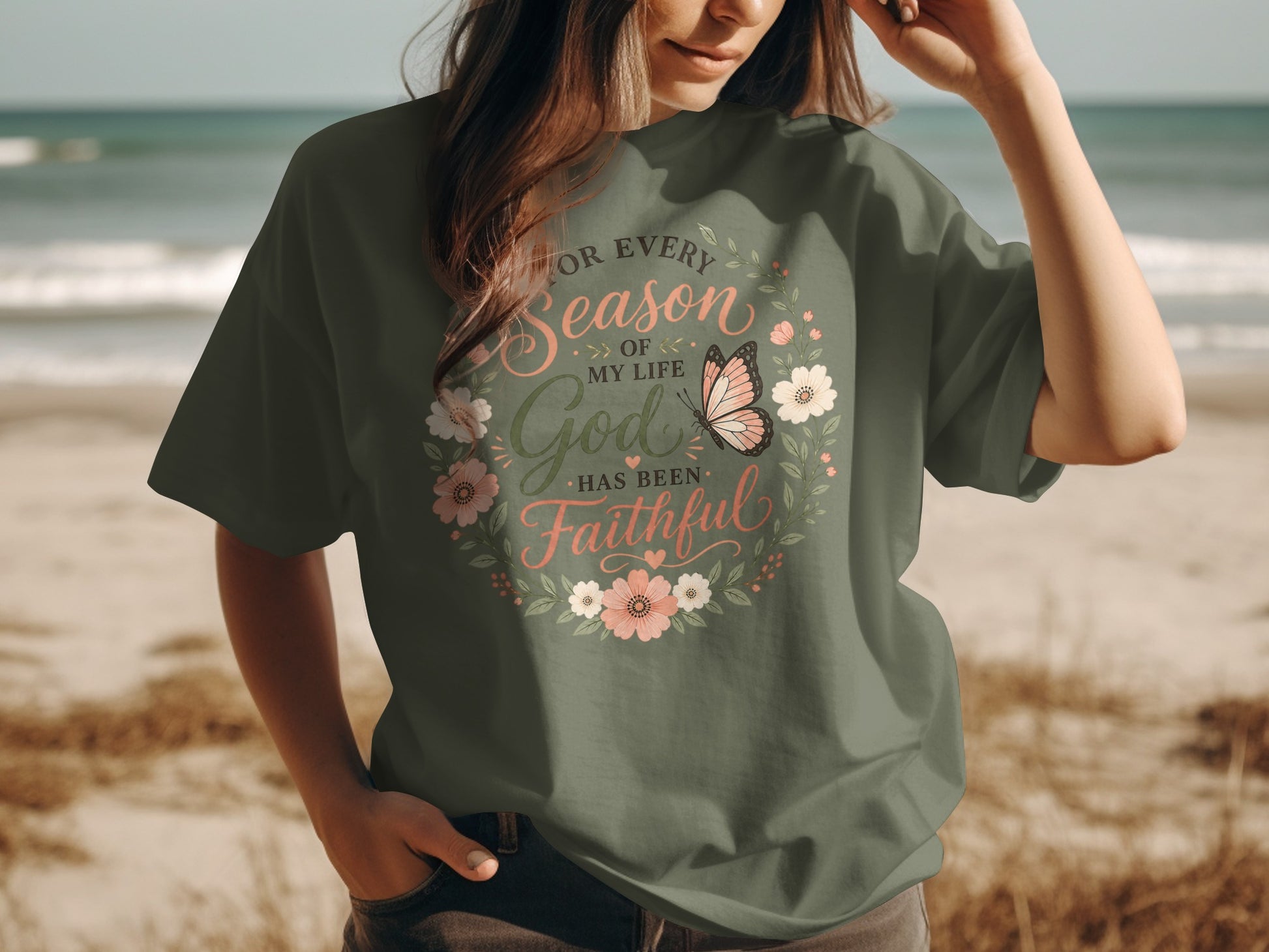 T-shirt with floral wreath, butterfly, and text "For every season of my life God has been faithful."