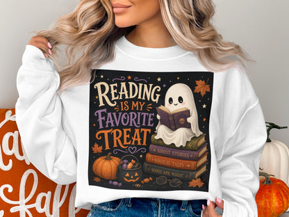 Ghost reading on books with text "Reading is my favorite treat" and Halloween decorations.