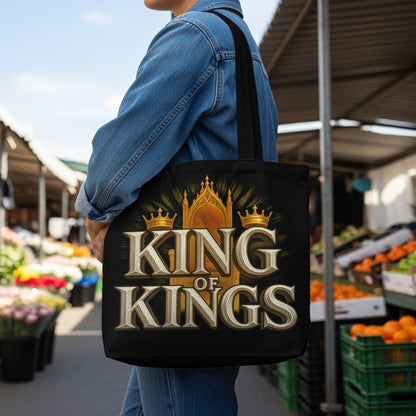 Black tote bag with "KING OF KINGS" text and a crown design.
