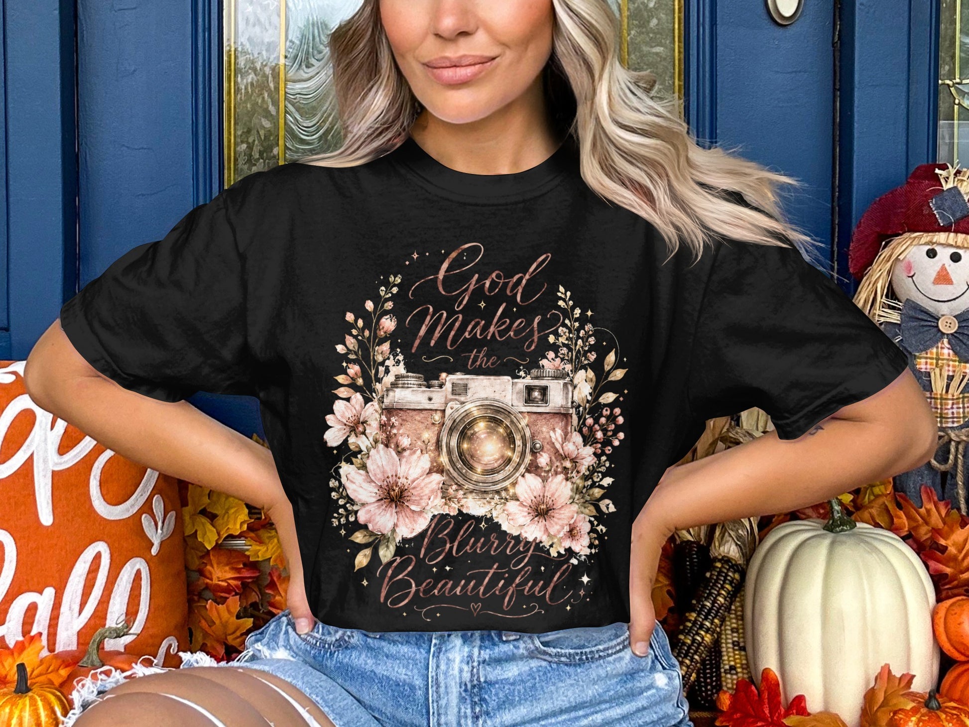 Black t-shirt with vintage camera floral graphic and text "God Makes the Blurry Beautiful."