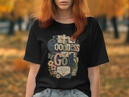 Black t-shirt with "Goodness of God" and floral cross design.