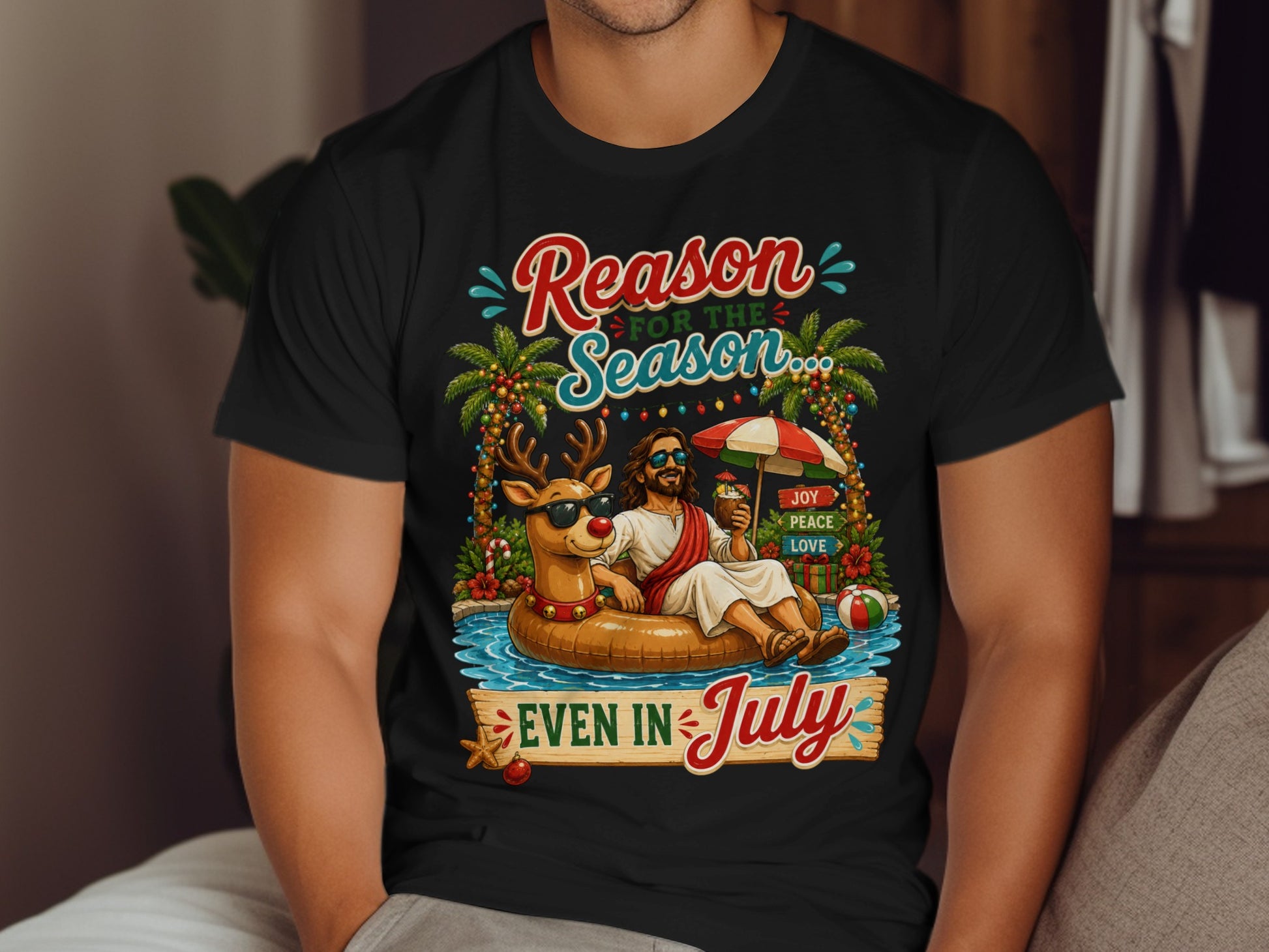 Jesus on an inner tube with sunglasses, reading "Reason for the Season Even in July".
