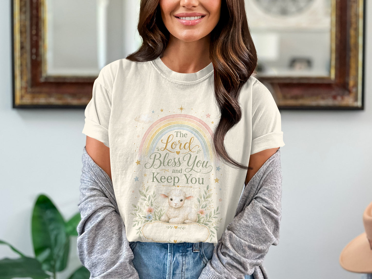 Cream t-shirt with rainbow, lamb, and text "The Lord Bless You and Keep You".