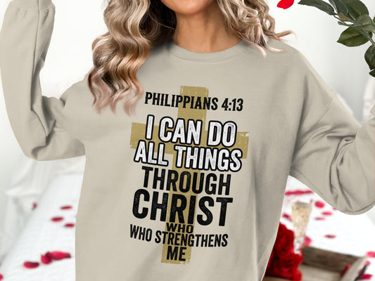 Crewneck sweatshirt with "Philippians 4:13" and a gold cross graphic.