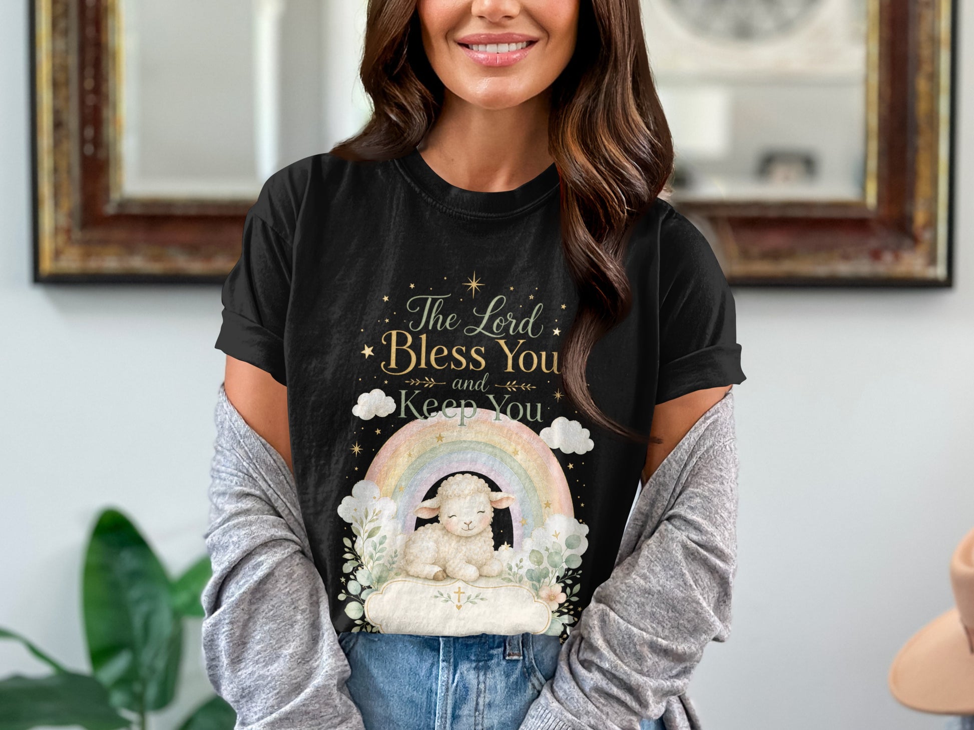 Black t-shirt with "The Lord Bless You and Keep You" text and a lamb on a rainbow.