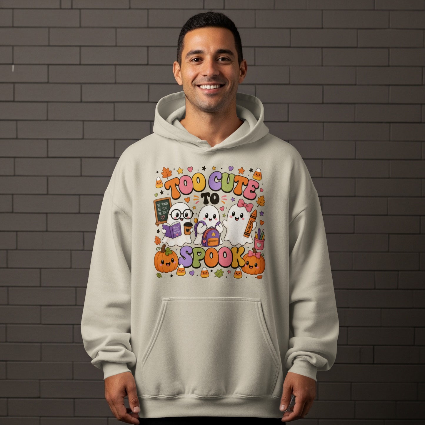 Cream hoodie with "Too Cute To Spook" and three ghost graphics.