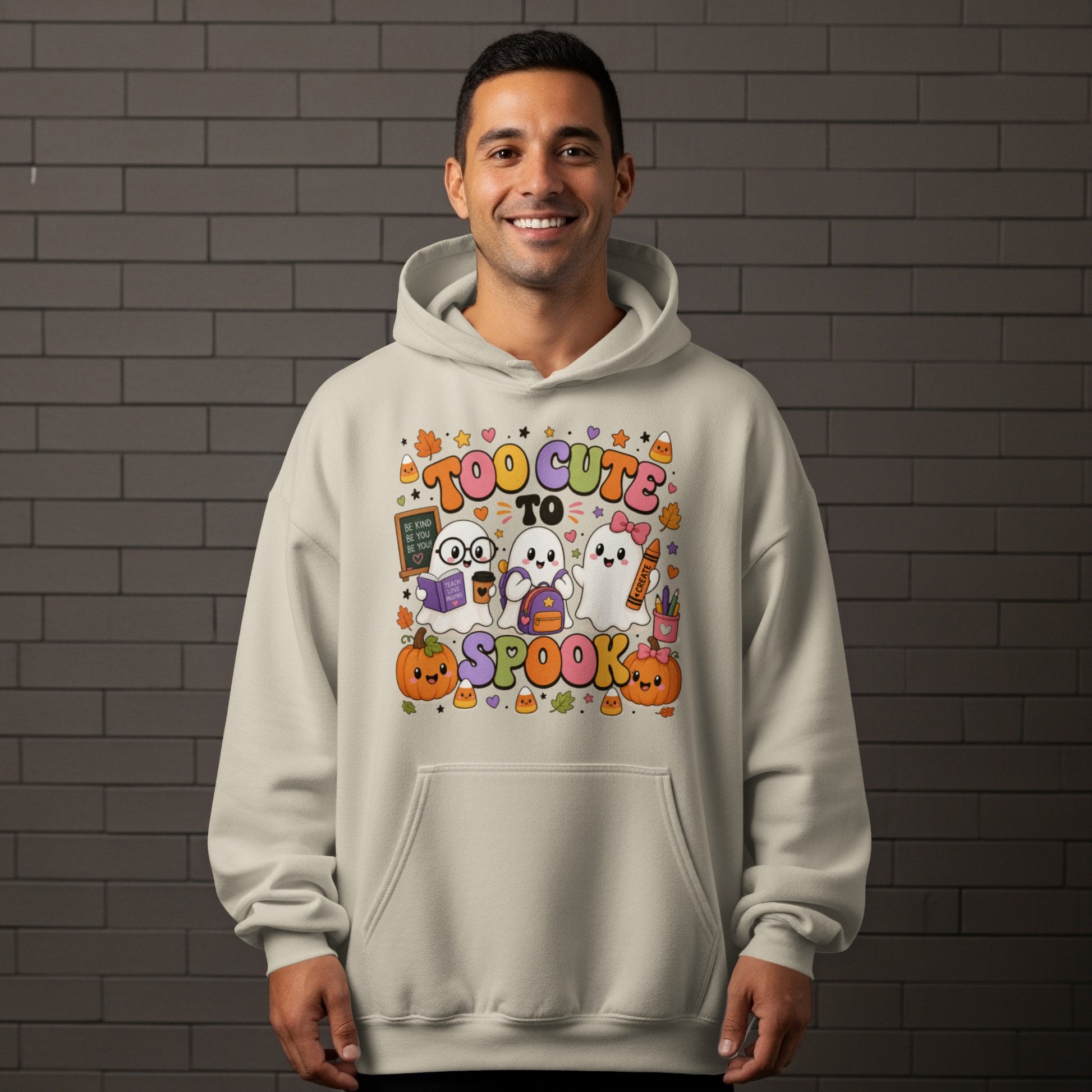 Cream hoodie with "Too Cute To Spook" and three ghost graphics.