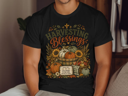 Black t-shirt with "Harvesting Blessings" and Psalm 107:1 text.