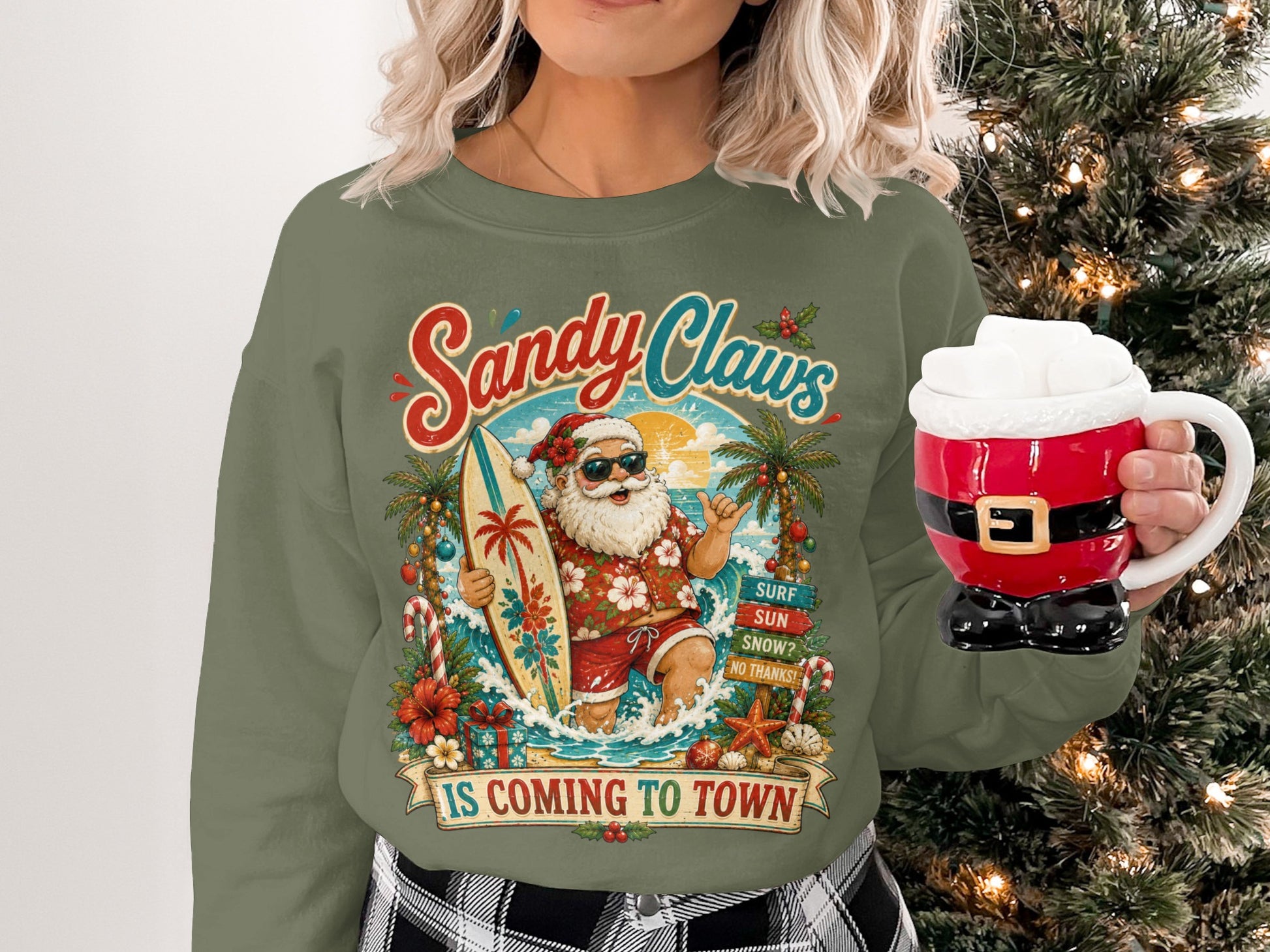 Crewneck sweatshirt with "Sandy Claws" text, Santa surfing, and festive holiday graphics.