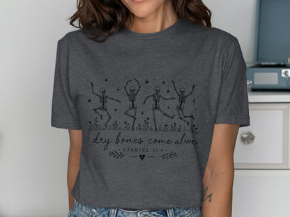 Dark gray t-shirt with dancing skeletons and "dry bones come alive" text.