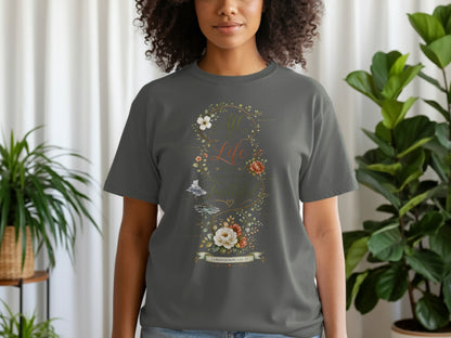 Gray t-shirt with floral design and text "All my life you have been faithful. Lamentations 3:22-23".
