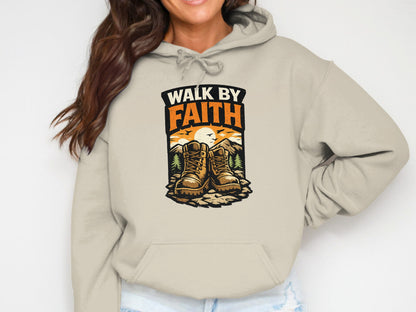 Beige hoodie with "Walk by Faith" text and hiking boots illustration.