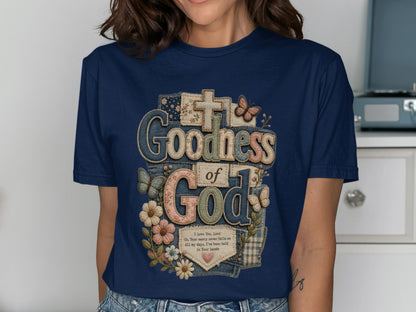 Navy t-shirt with "Goodness of God" text and floral patchwork.