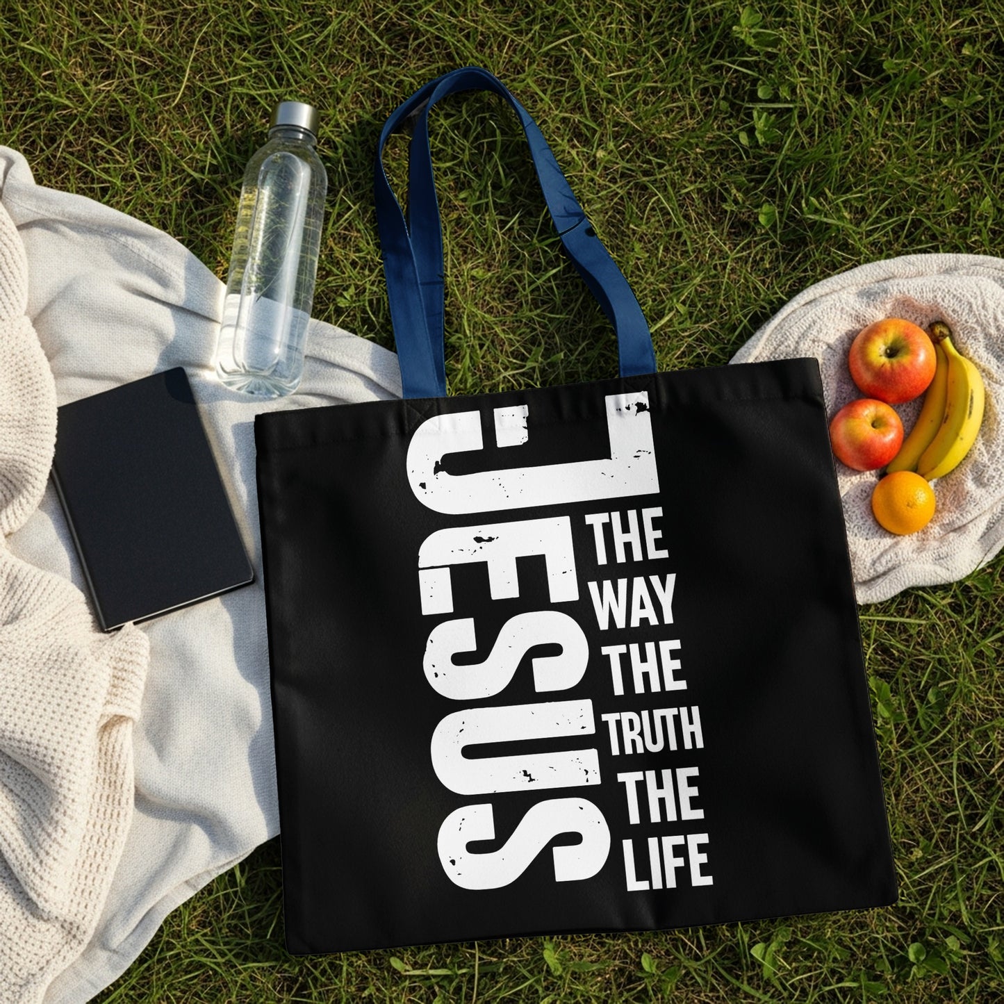 Black tote bag with "Jesus, The Way, The Truth, The Life" text.