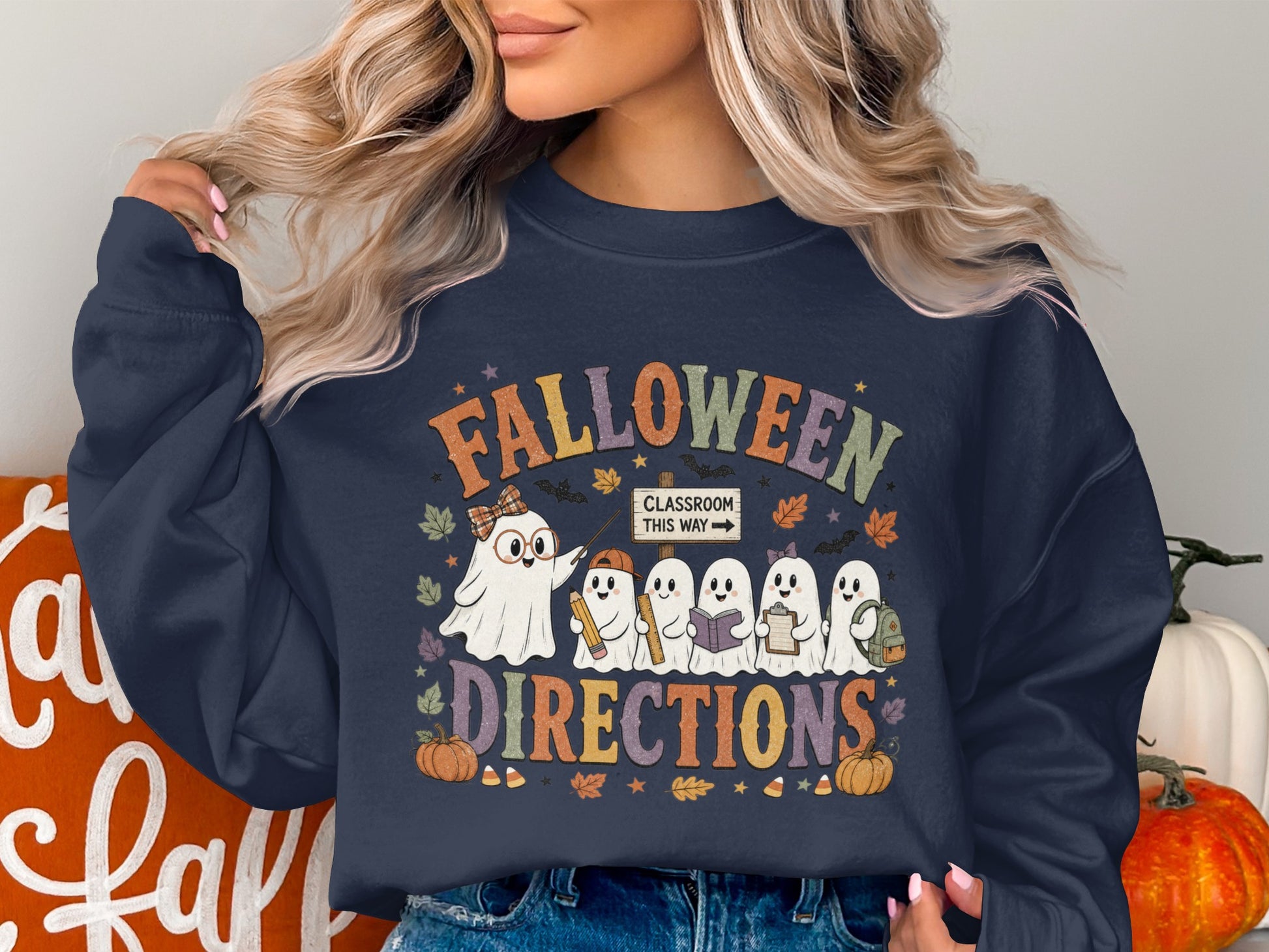 Falloween Directions graphic with cute ghosts holding school supplies and a classroom sign.