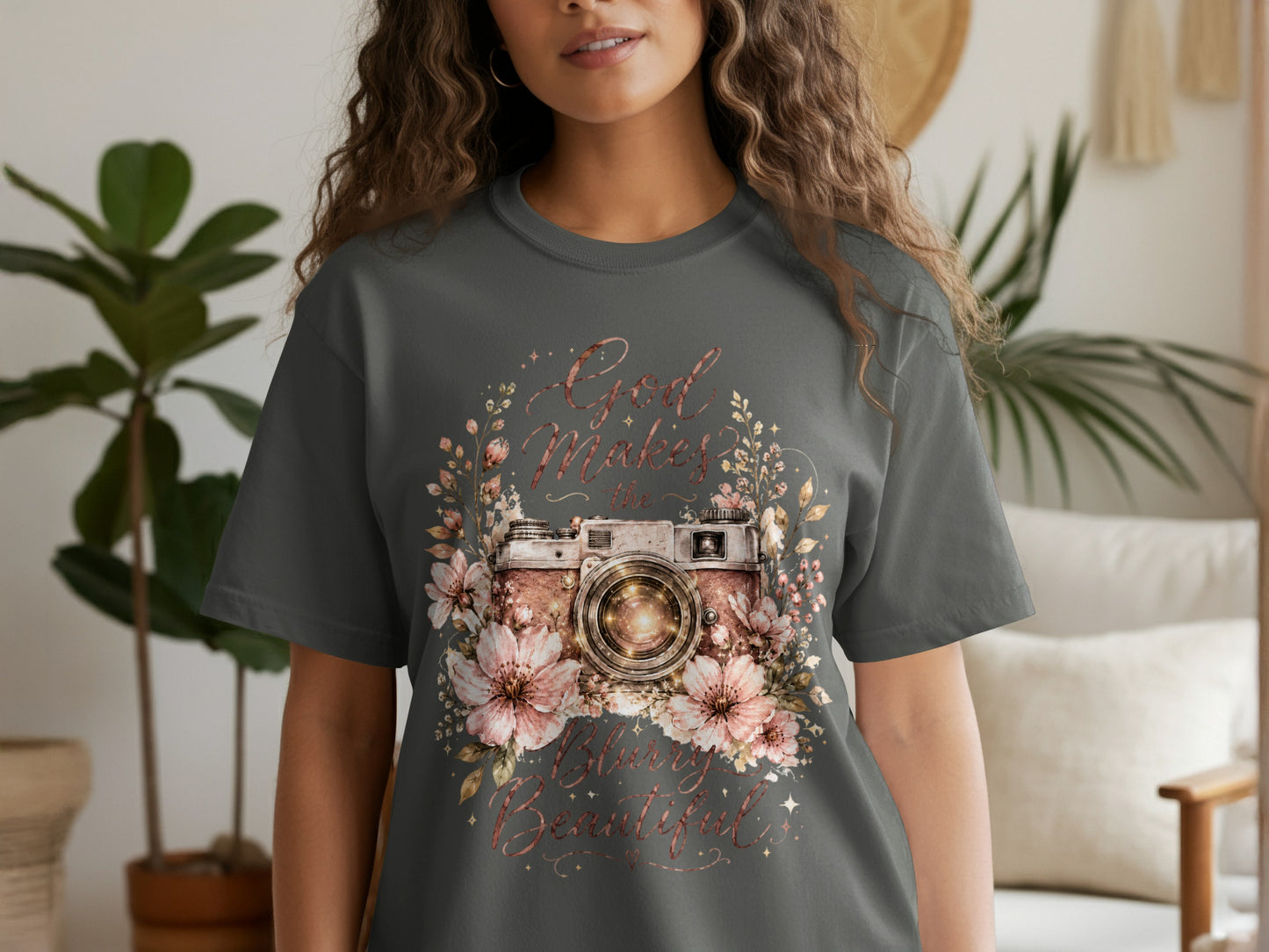 Gray t-shirt with a vintage camera surrounded by flowers and text "God Makes the World Beautiful."