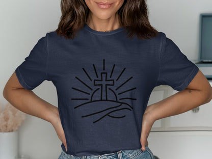 Dark navy t-shirt with a black line art graphic of a cross rising over hills.