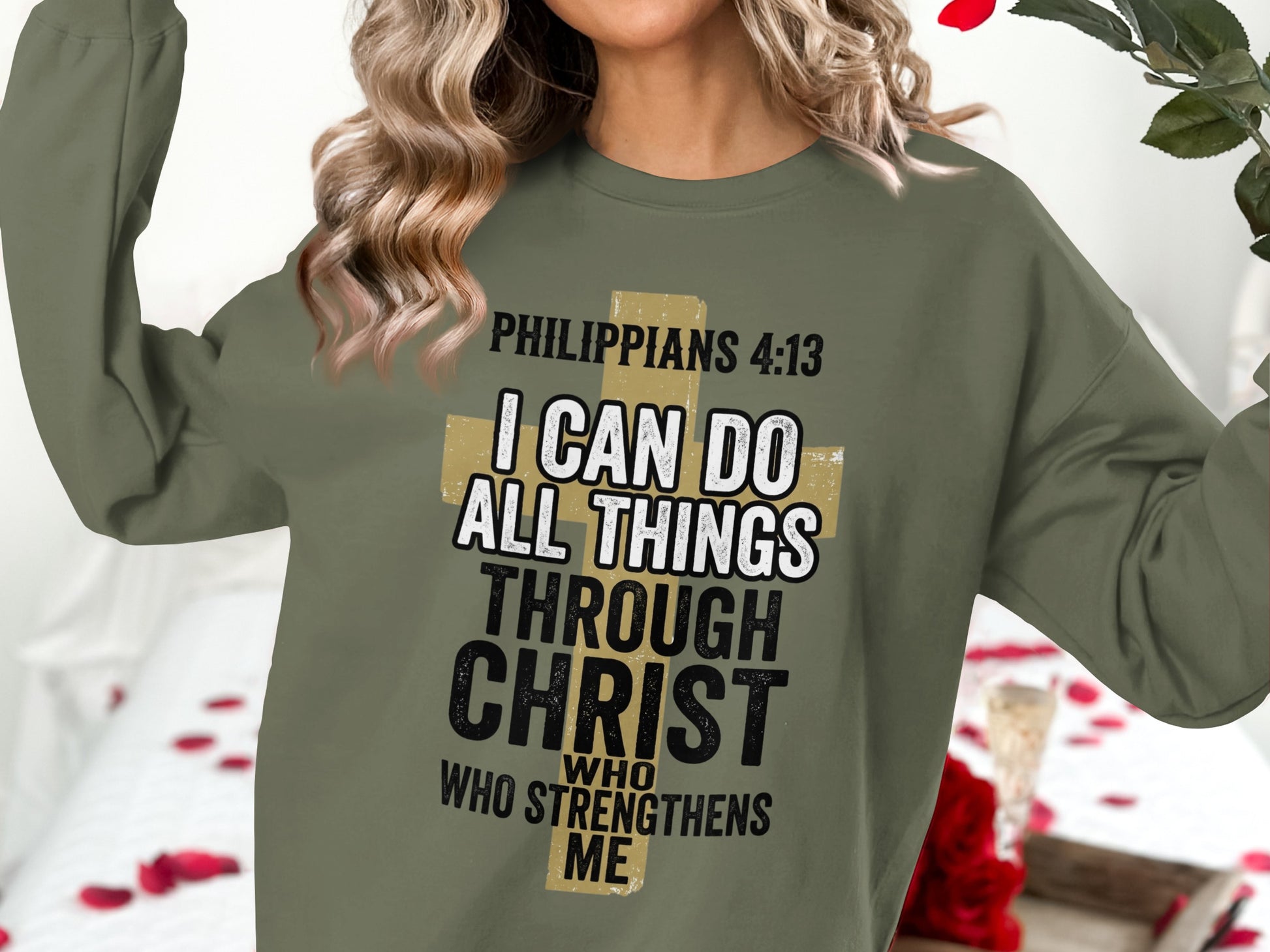 Olive green sweatshirt with "Philippians 4:13 I can do all things through Christ who strengthens me" and a cross.
