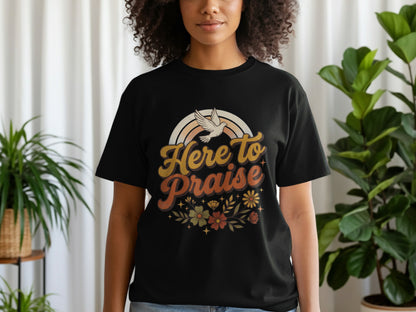 Black t-shirt with "Here To Praise" text, dove, and floral design.