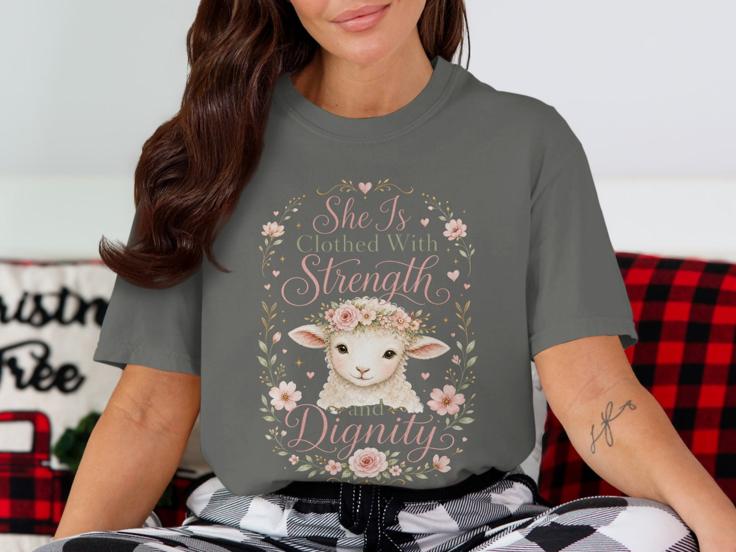 Gray t-shirt with a lamb wearing a floral crown and text "She Is Clothed With Strength and Dignity".