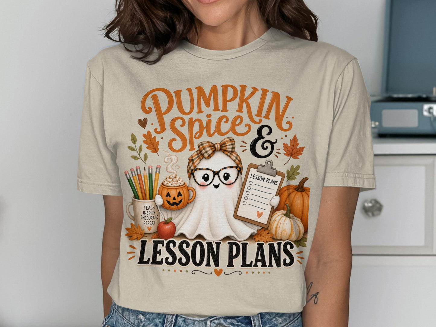 "Pumpkin Spice & Lesson Plans" t-shirt with ghost holding clipboard and pumpkins.