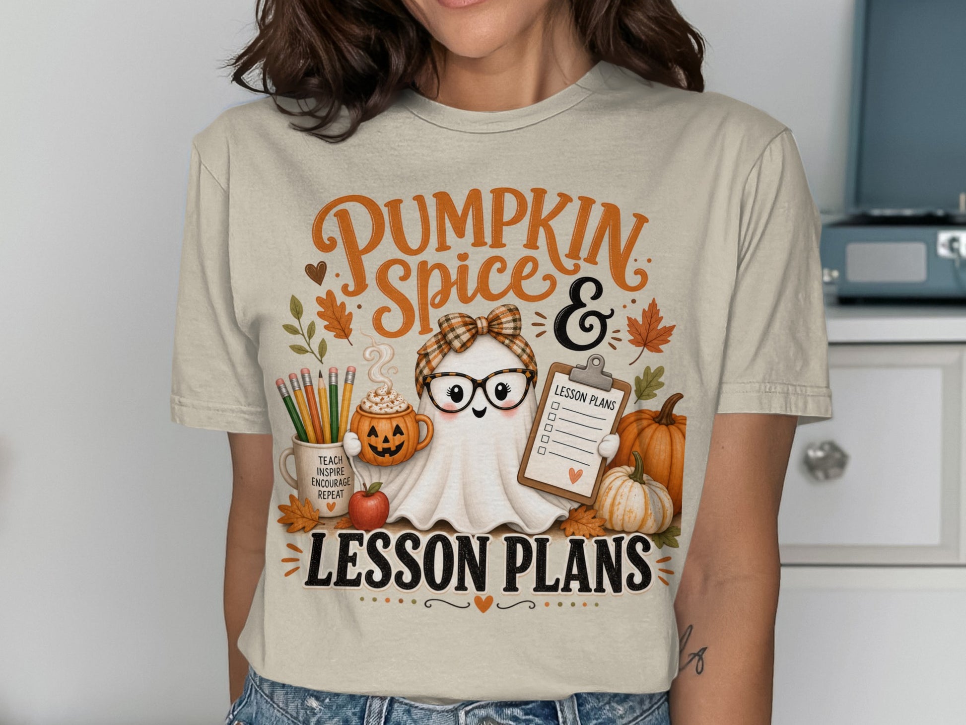 "Pumpkin Spice & Lesson Plans" t-shirt with ghost holding clipboard and pumpkins.