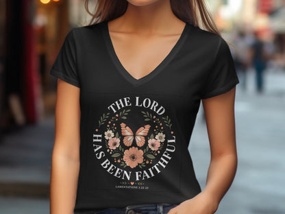 Black t-shirt with floral wreath, butterfly, and text "THE LORD HAS BEEN FAITHFUL".