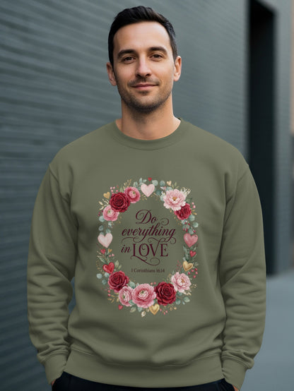 Olive green sweatshirt with floral wreath and "Do everything in love" text.