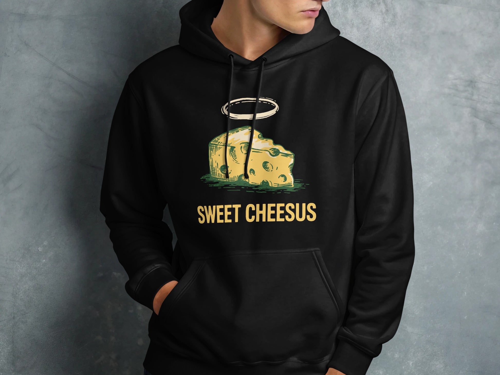 Black hoodie with "SWEET CHEESUS" text and cartoon cheese slice with halo.