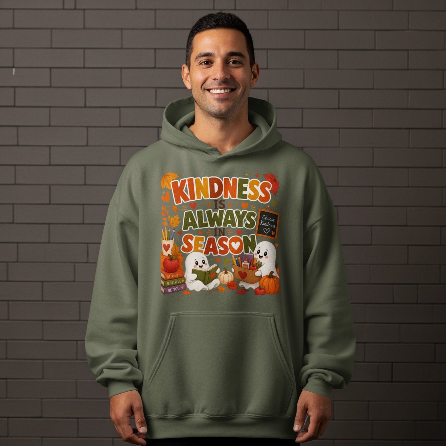 Green hoodie with "Kindness is always in season" text and cute ghosts.
